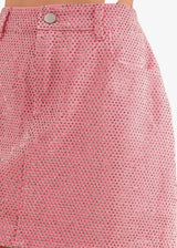 Hot pink studded denim skirt