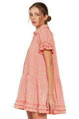 Orange and white gingham baby doll dress