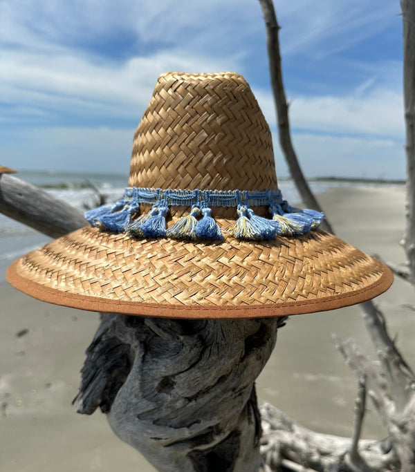 Straw hat with periwinkle tassel