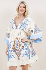 Cream embroidered tunic with light blue detail