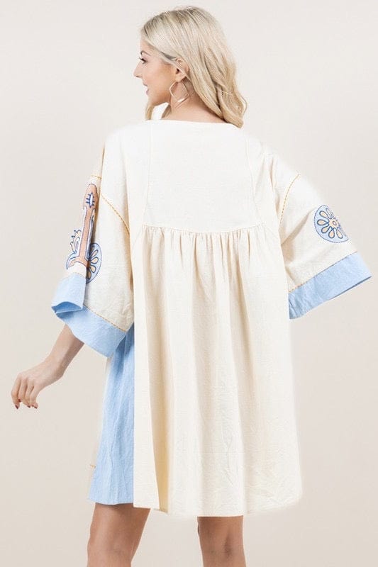 Cream embroidered tunic with light blue detail