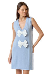 Sky blue sweater dress with white bows