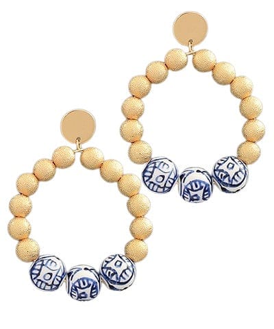 Gold ball hoop earrings with blue and white beads