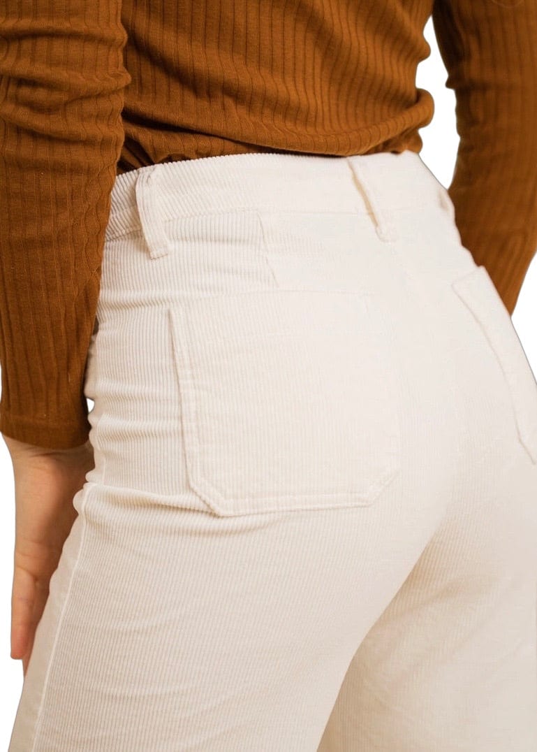 Off white corduroy button front pants