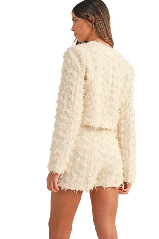 Cream textured tweed jacket and skort set