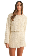 Cream textured tweed jacket and skort set