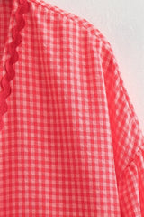 Red textured gingham top with tie front